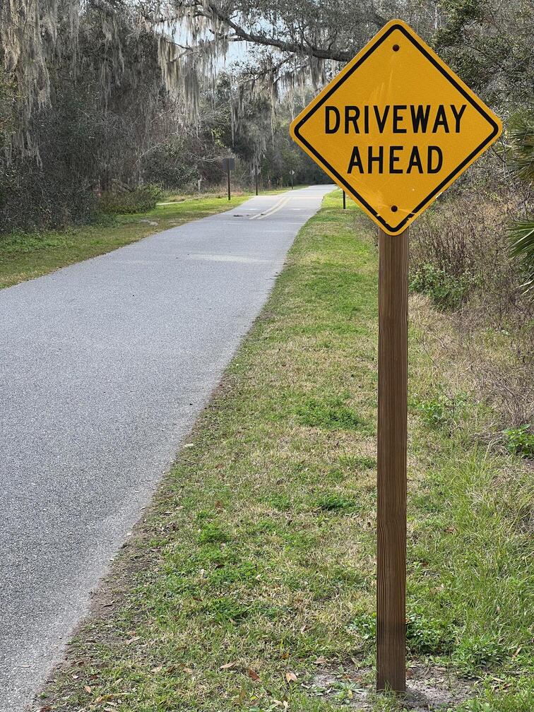 driveways cross the trail