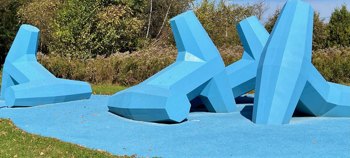 blue playground and sculpture 